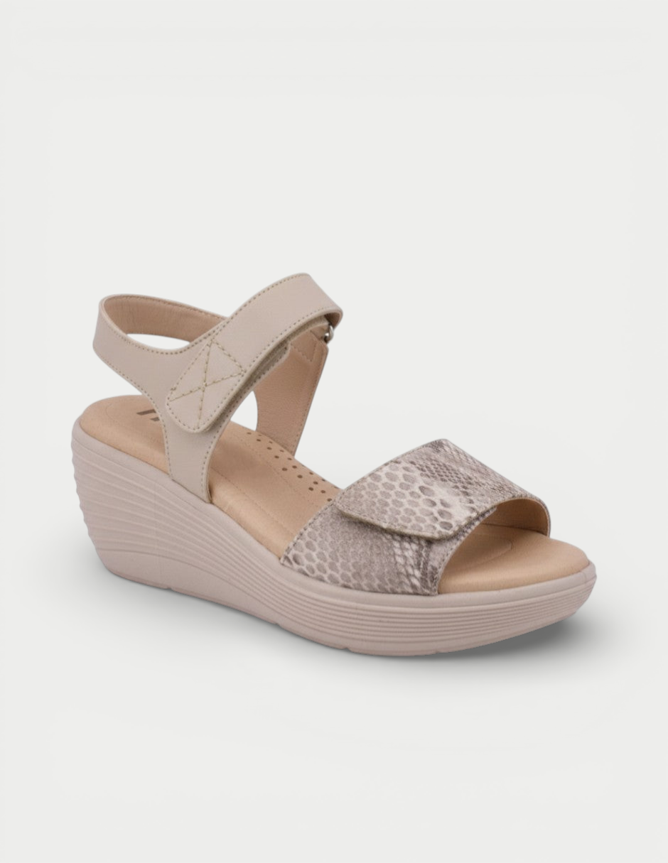 Manet Bella 01 beige wedge sandals with adjustable ankle strap and snake print detail. Comfortable ergonomic platform.