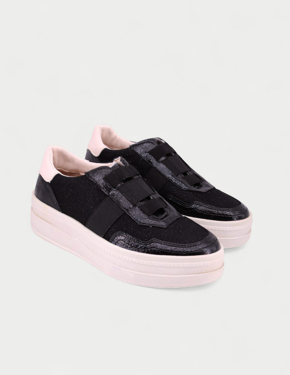 Manet Ema 01 black glitter sneakers with patent accents and a low platform sole. Features elastic straps for slip-on style.