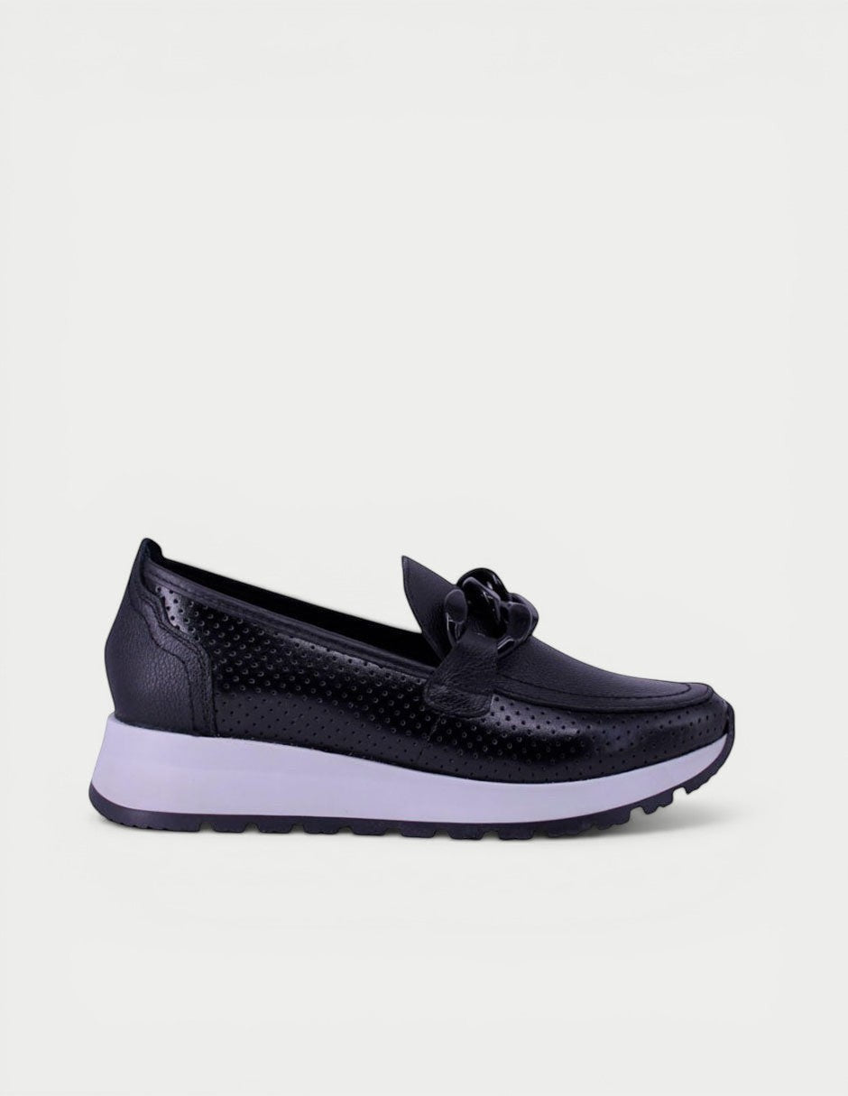 Manet black leather perforated loafer with elevated sole and decorative chain detail.