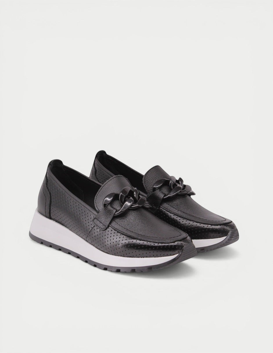 Manet black leather perforated loafers with elevated sole and chain detail. Comfortable and stylish for all-day wear.