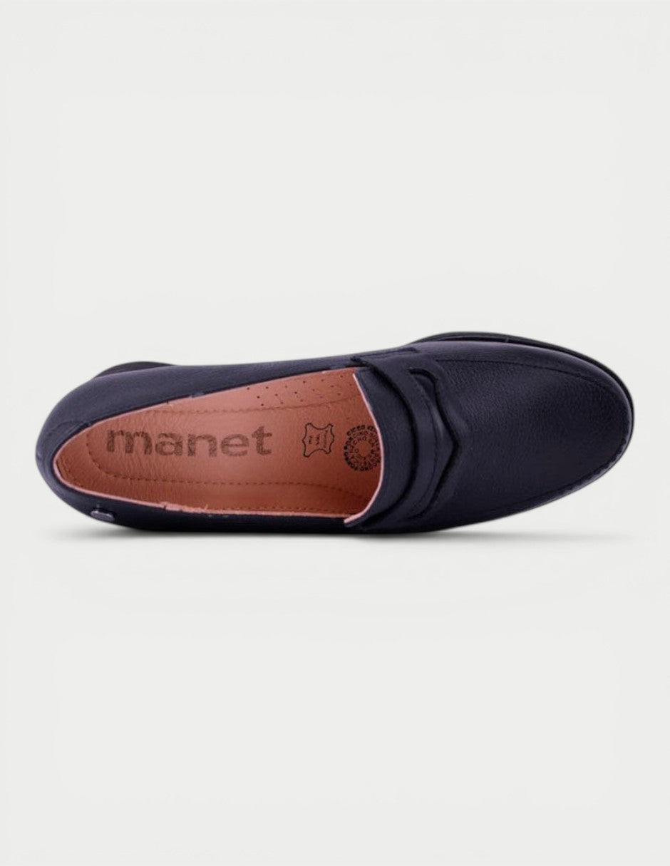 Manet dark blue leather moccasin with a subtle heel and clean, structured silhouette. Perfect for modern women.