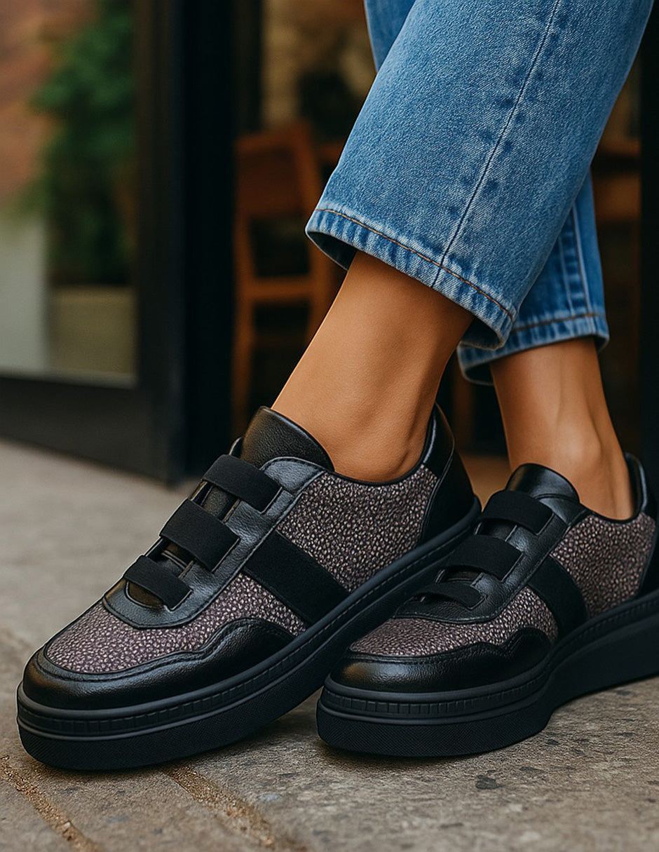 Manet Ema 01 black leather sneakers with textured stone-like panels and velcro straps.