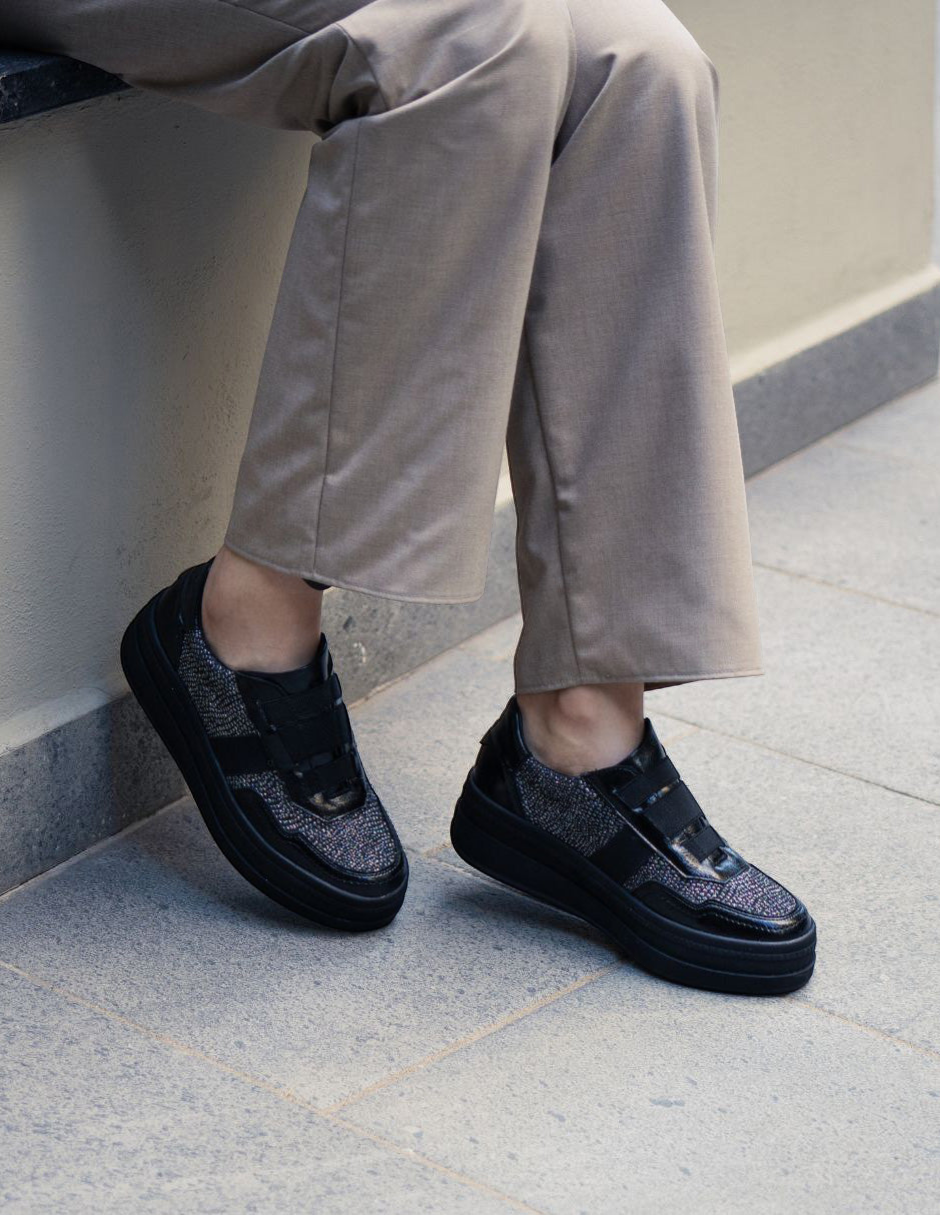 Manet Ema 01 black sneakers with low platform and sparkling stone details on the toe box.