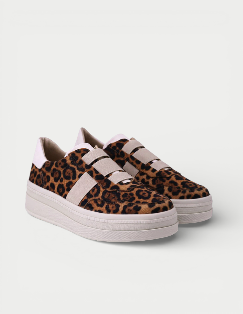 Manet Ema 01 leopard print slip-on sneakers with beige elastic straps and a white platform sole.