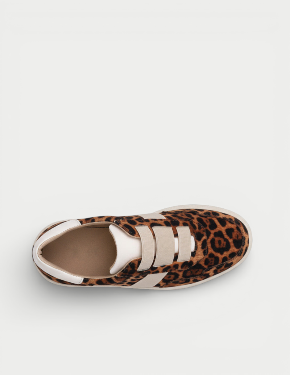 Manet Ema 01 leopard print sneakers with white trim and beige elastic straps.