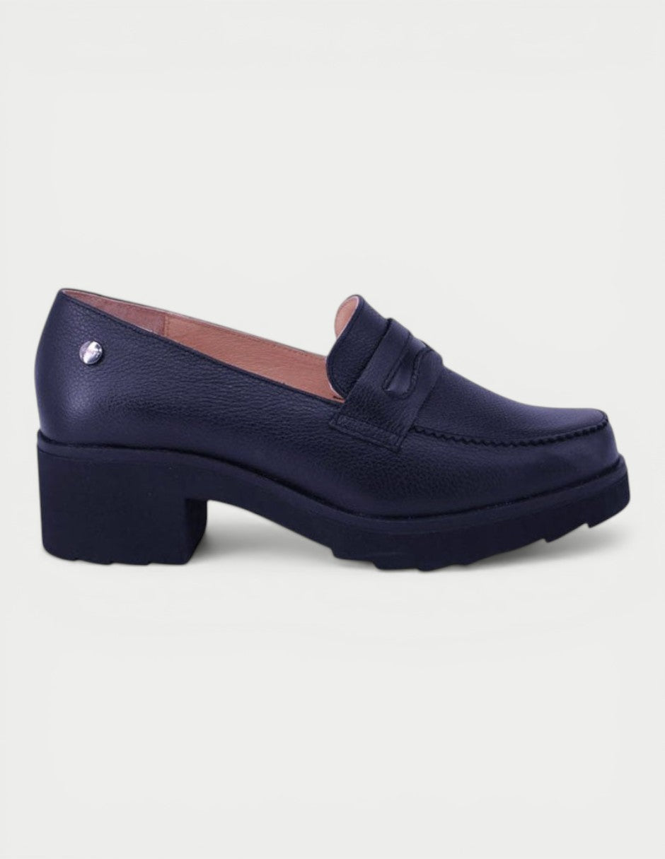 Manet navy blue leather loafer with block heel and decorative strap detail. Timeless, modern style for women.
